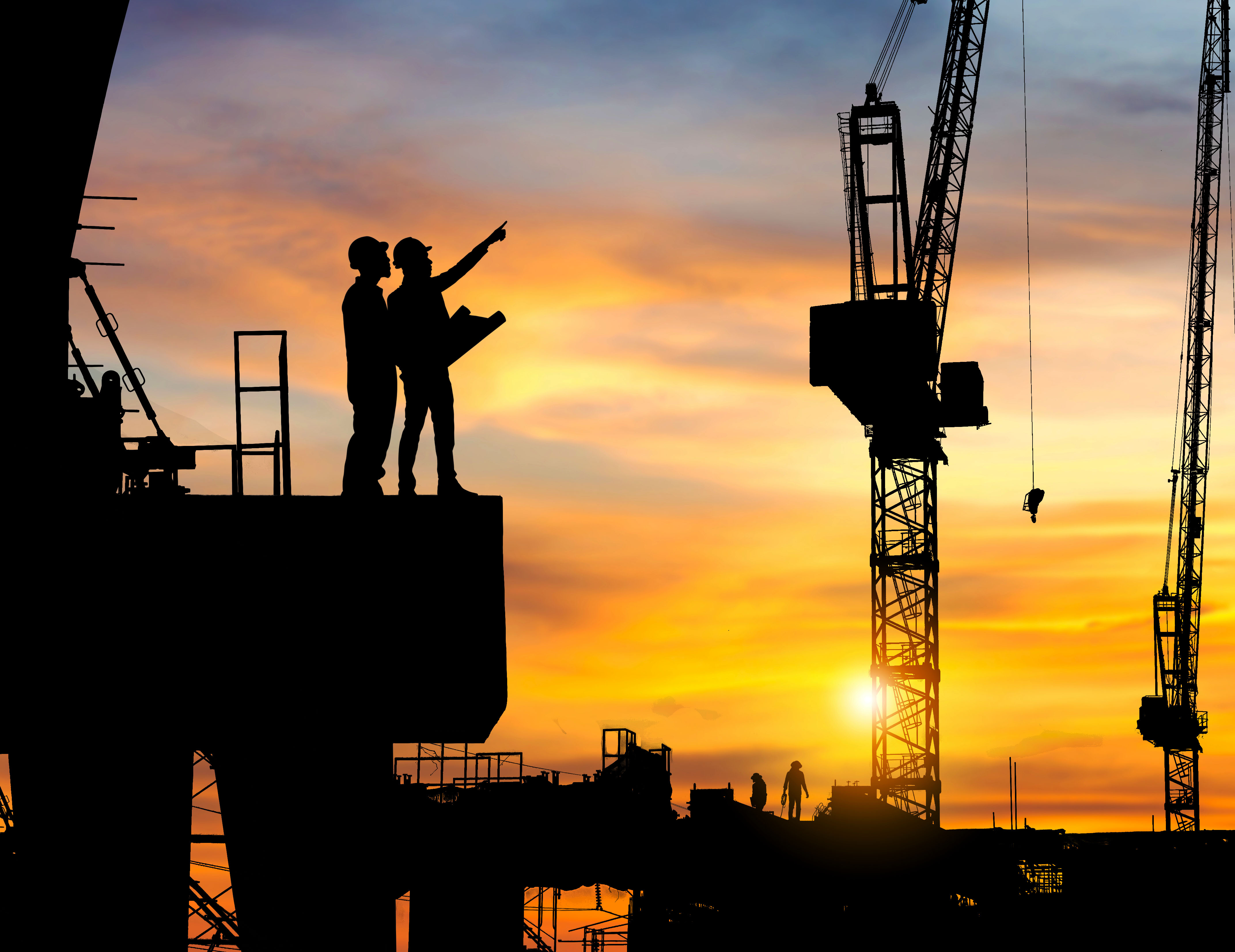 silhouette-engineer-worker-checking-project-construction-siteat-sunset-evening-timeedit